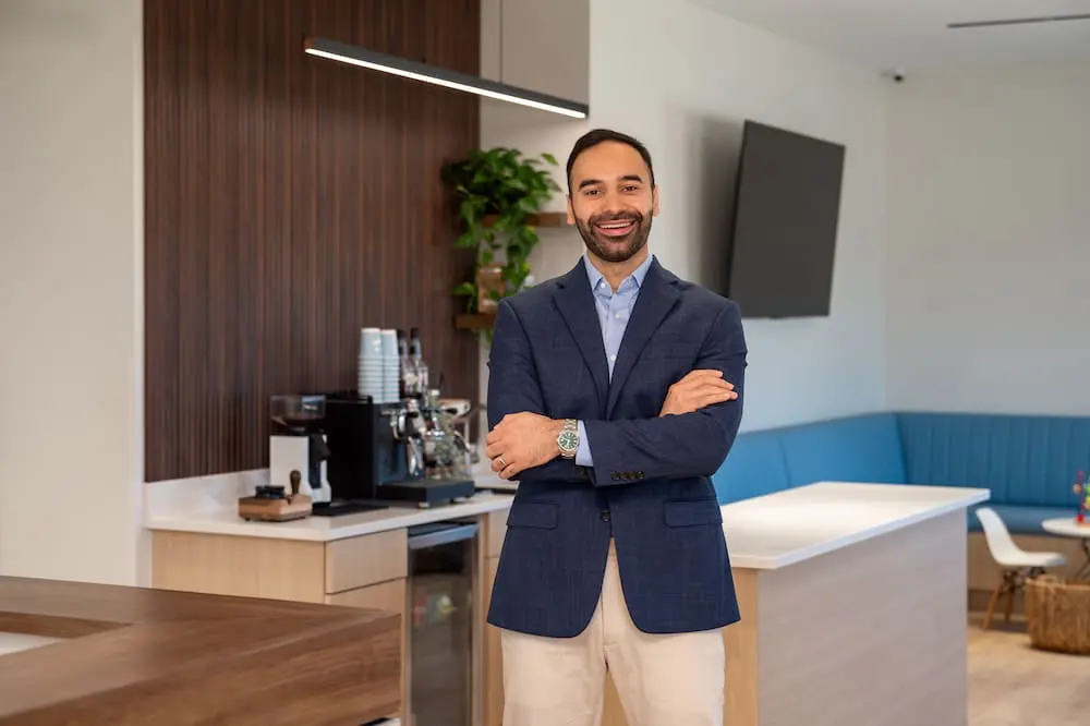 A portrait of Dr. Mo, a board-certified orthodontist in Prosper, TX.